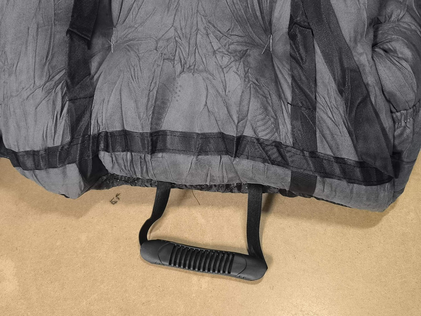 sewn-on anchor under the dog car seat that goes between backrest and seat